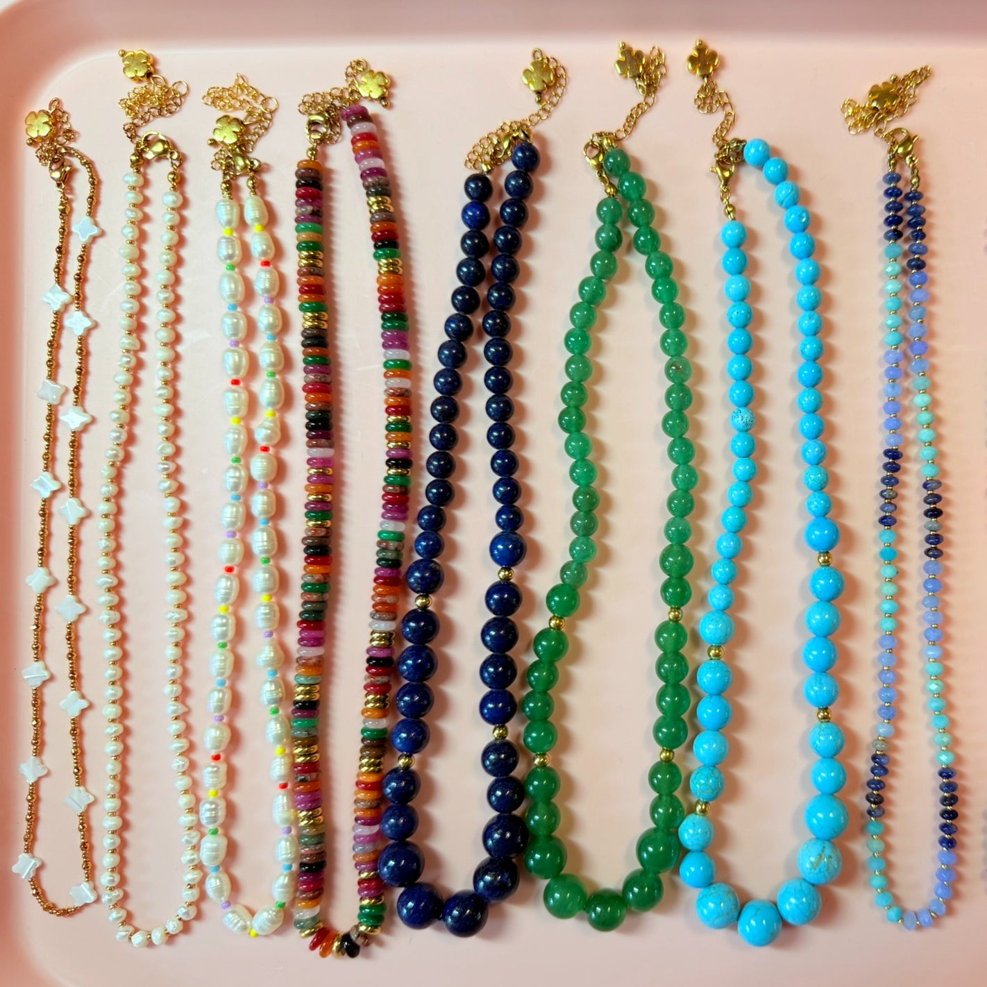 Collection of colourful beaded necklaces