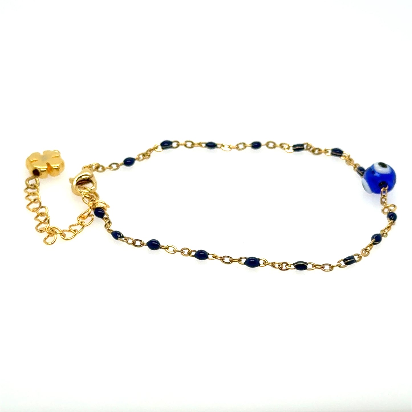 Gold bracelet with evil eye blue bead amd rosary chain on a white background