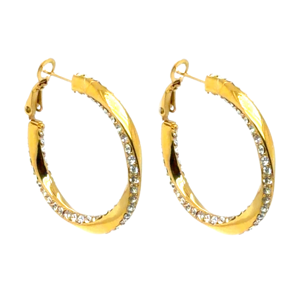A pair of gold hoop earrings with a textured finish and a row of clear rhinestones along the front, shown against a plain white background.