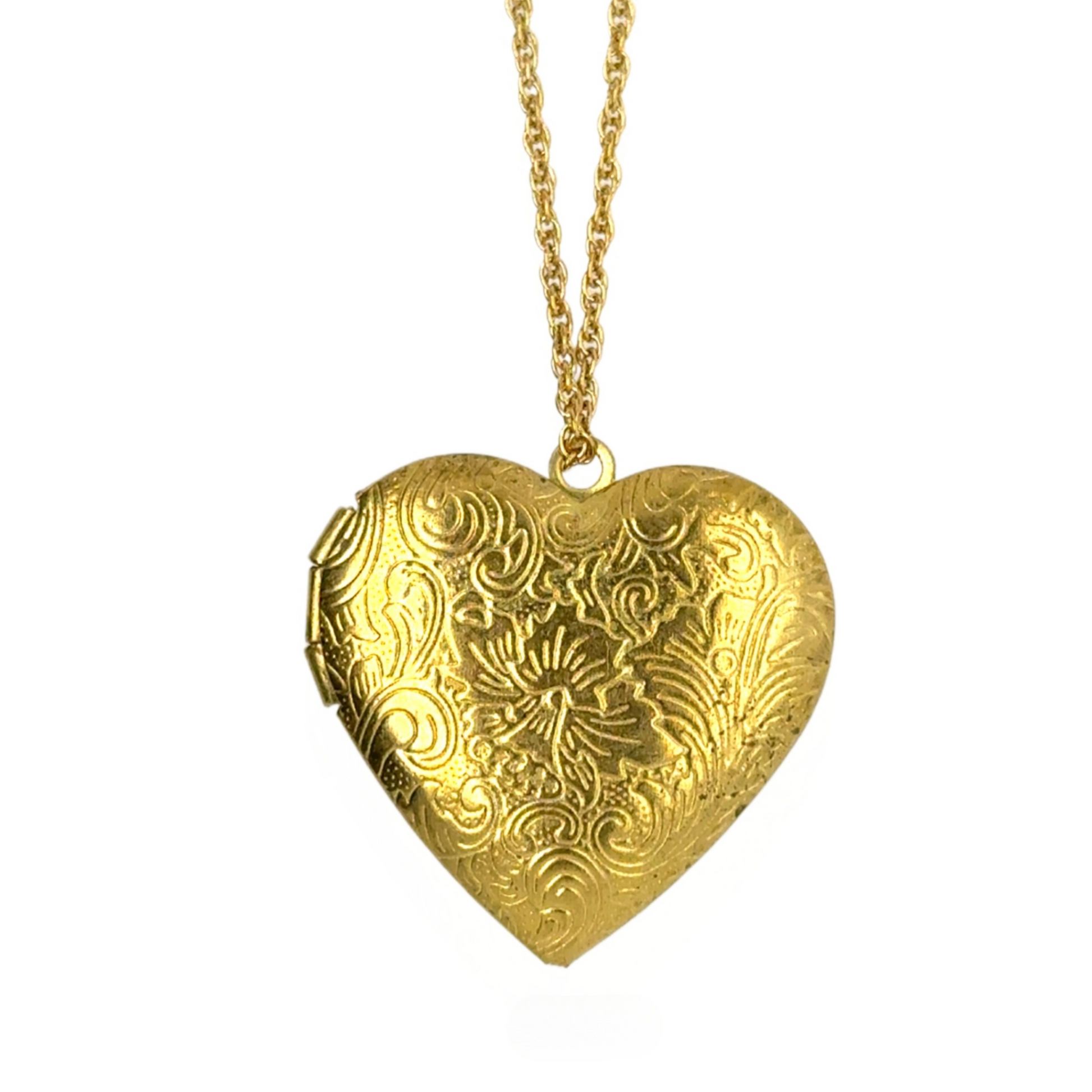 Delicate twisted belcher chain necklace with heart shaped locket with swirly engraving that opens at the side and can hold two little photos