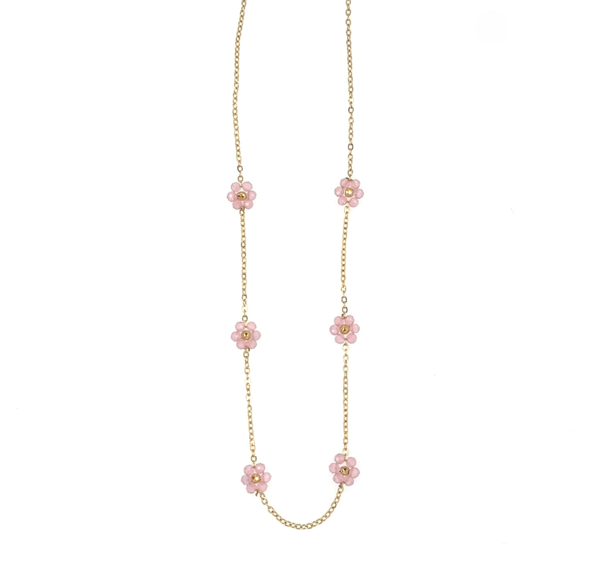 Necklace with six small light pink and gold flowers on a delicate chain