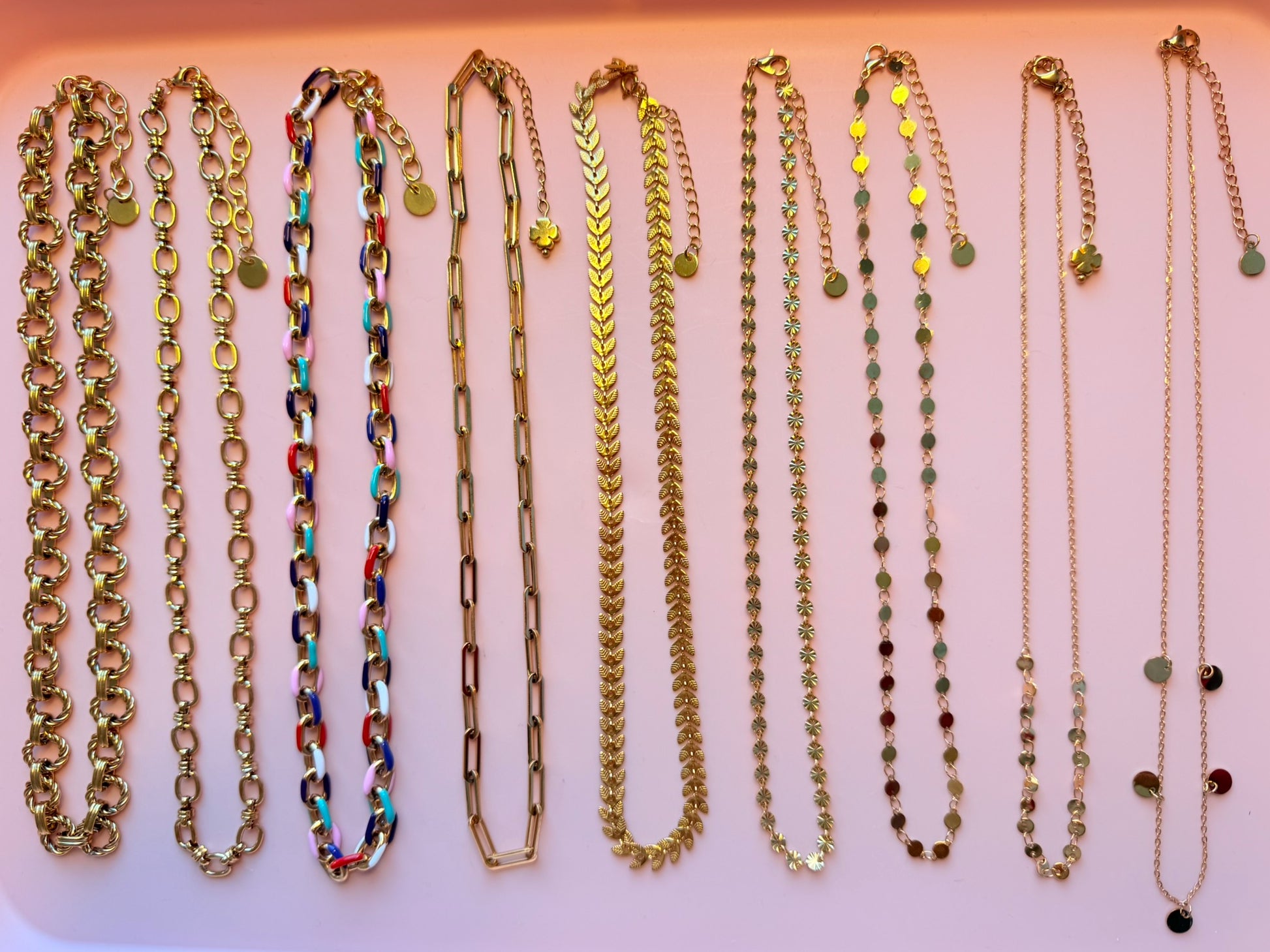 Variety of thick and thin gold chain necklaces