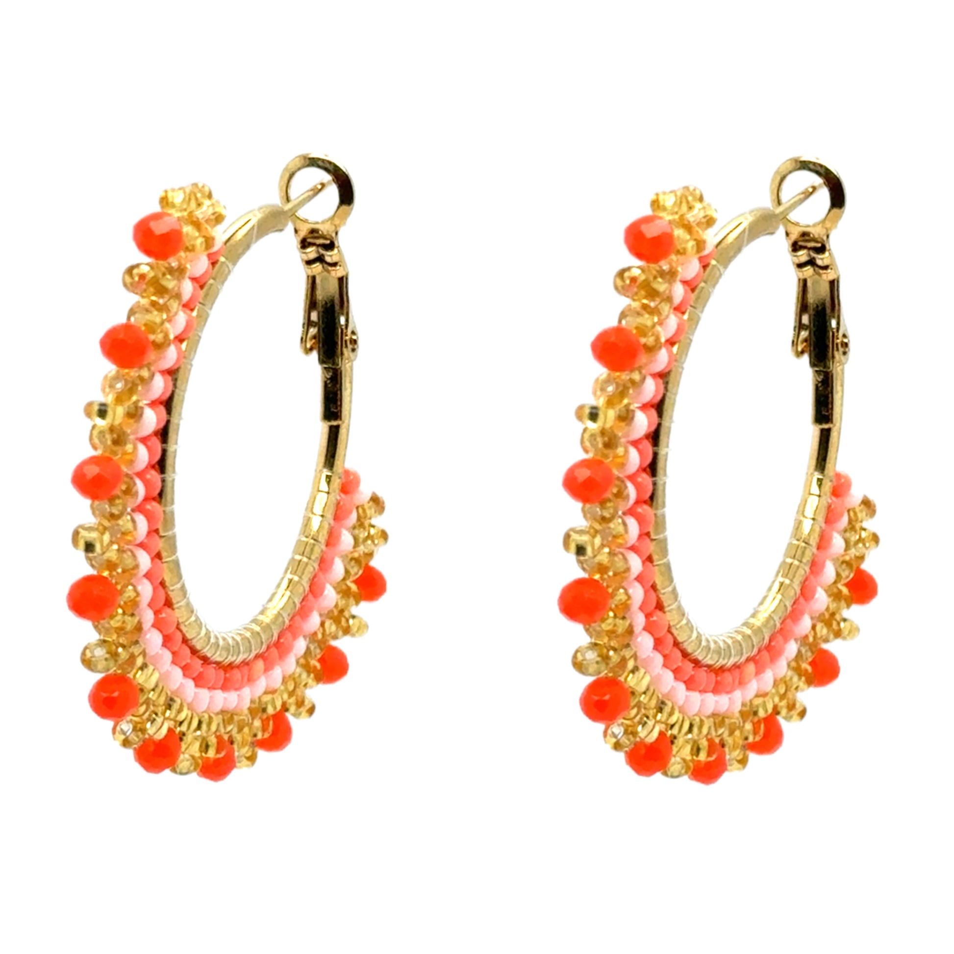 These lovely big beaded hoop earrings are orange and gold