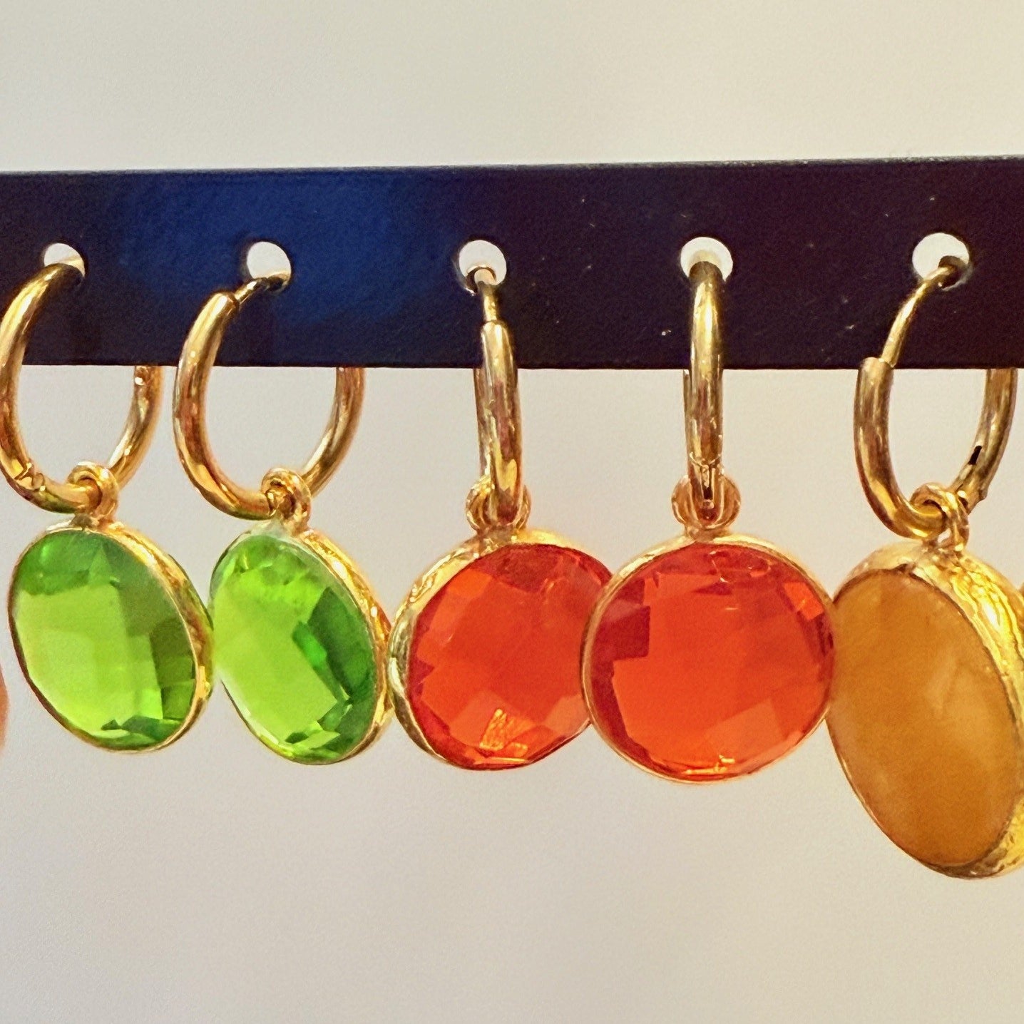 orange and peridot hoops
