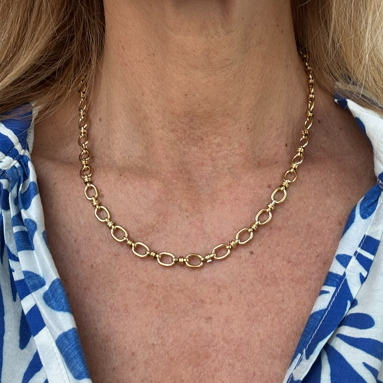 Gorgeous gold oval chain necklace won on model