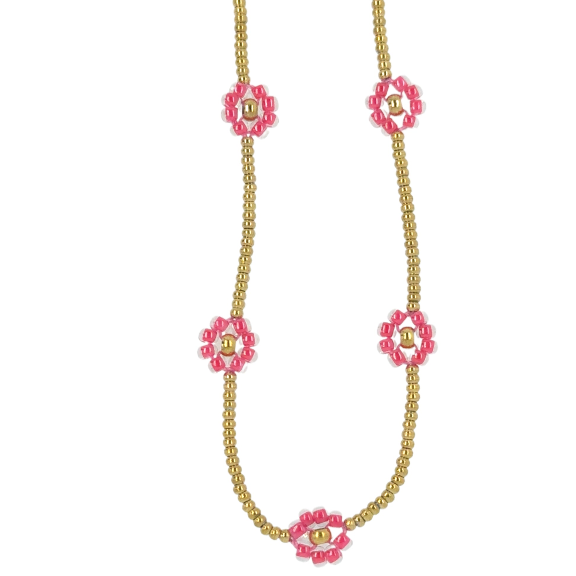 Necklace with seven small pink flowers on a gold bead chain.