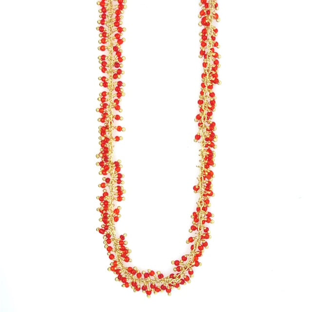 Gold necklace with red agate grape styled small charms all around