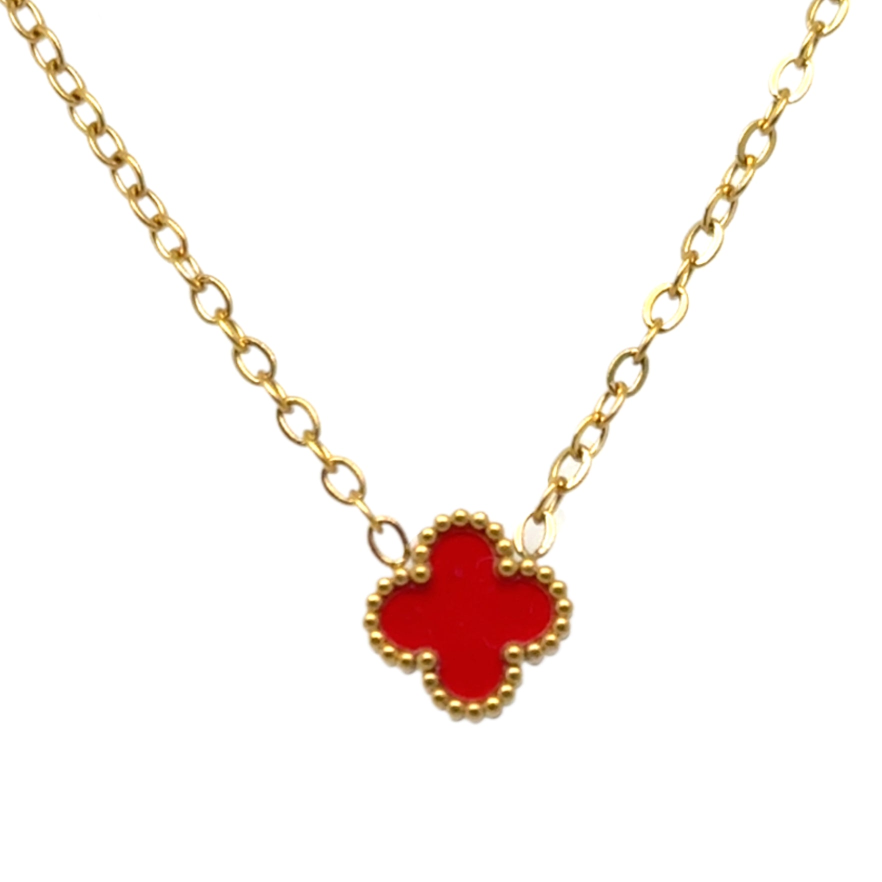 Delicate gold chain necklace with tiny 9mm red clover charm in the middle