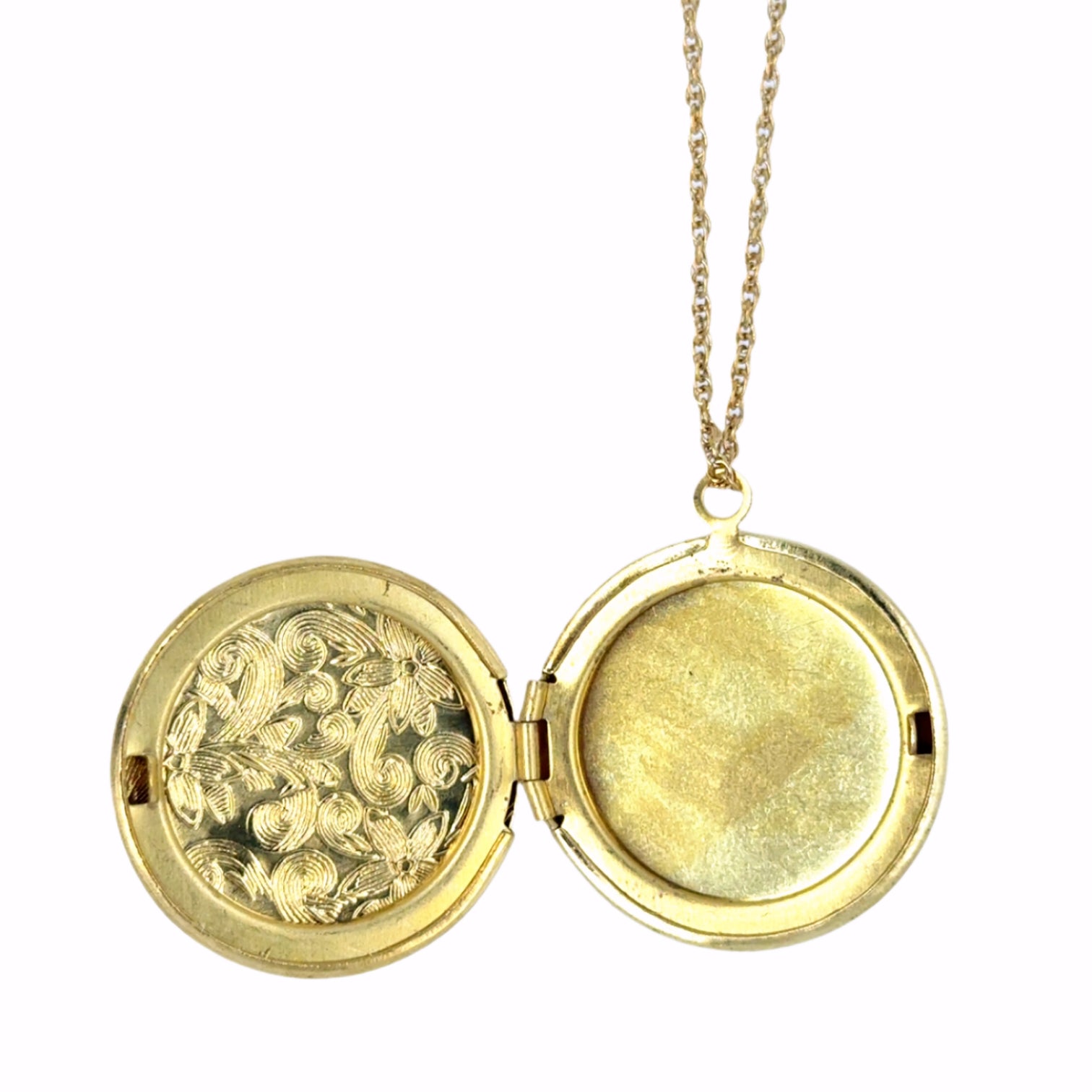 Delicate twisted belcher chain necklace with round locket with a lovely floral engracing that opens at the side and can hold two little photos shown open