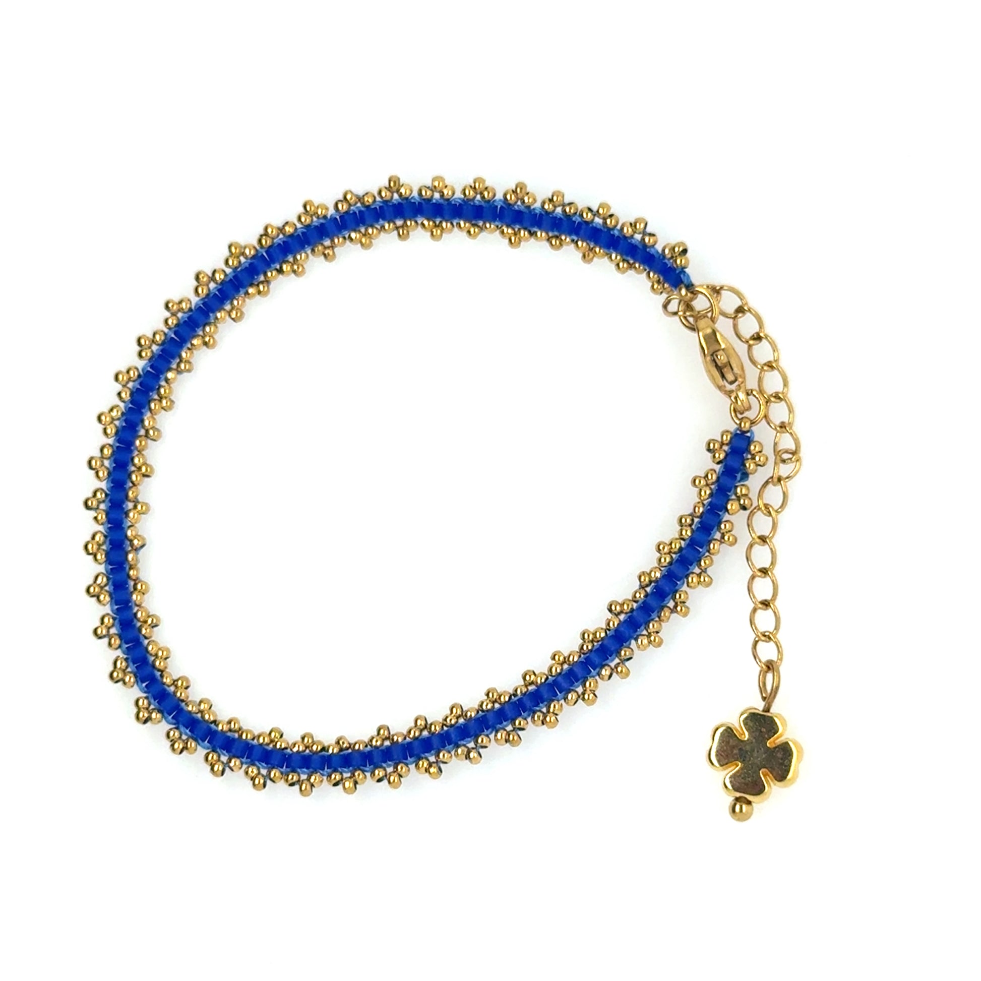 Lovely bracelet with blue Miyuki beads woven with gold beads