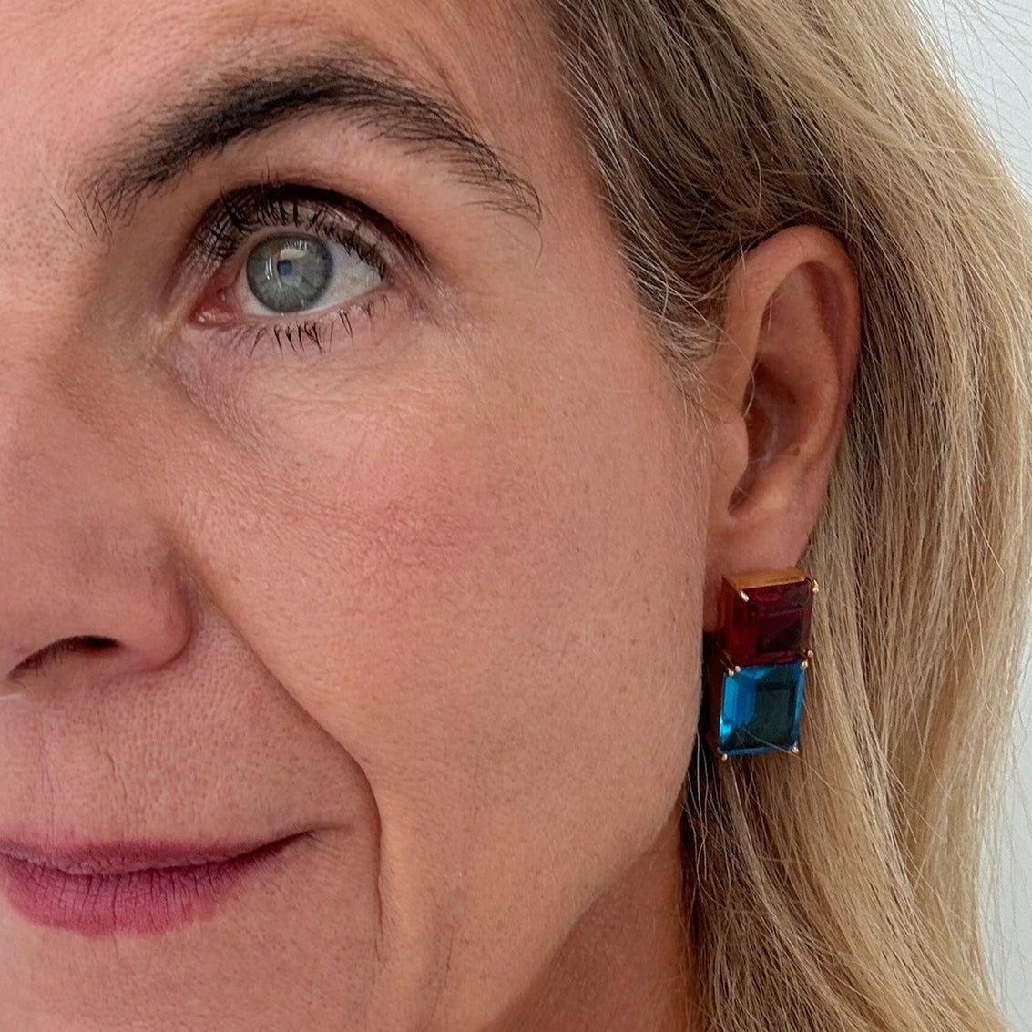 chunky ruby and sky blue quartz earrings worn on model