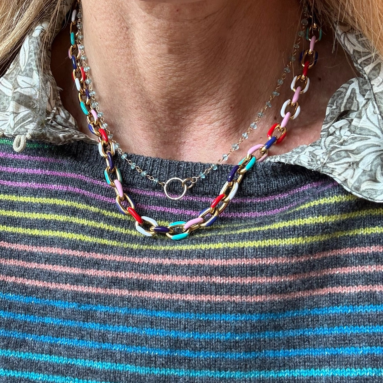Lovely red/blue/green/white enamel chain necklace worn with Apatite rosary chain necklace with interlocking circles charm in the middle