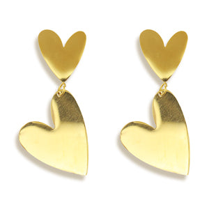 Big bold dangling gold earrings with two hearts