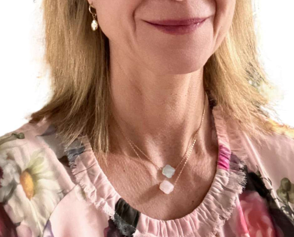 Delicate gold chain necklaces with one clover glass faceted charm in Light Blue and rose quartz