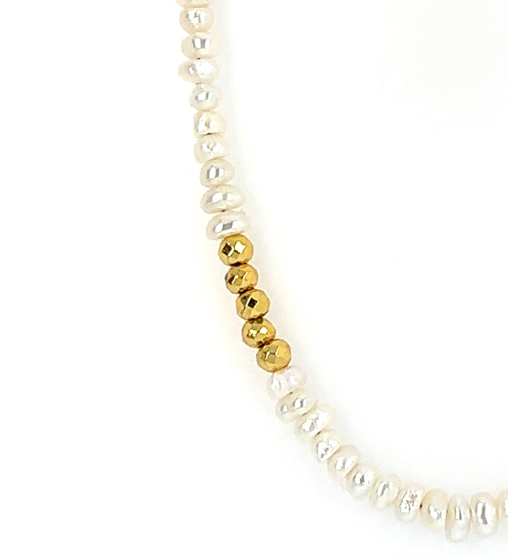 Necklace with elegant pearl and golden pyrite beads all around close up