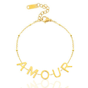 gold bracelet with word AMOUR written on it