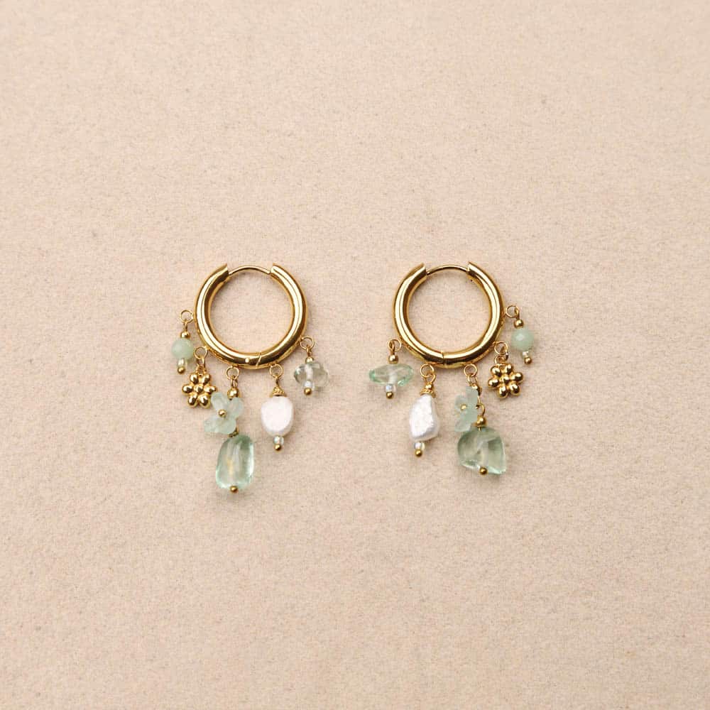 Medium sized gold hoop earrings with  green and gold charms