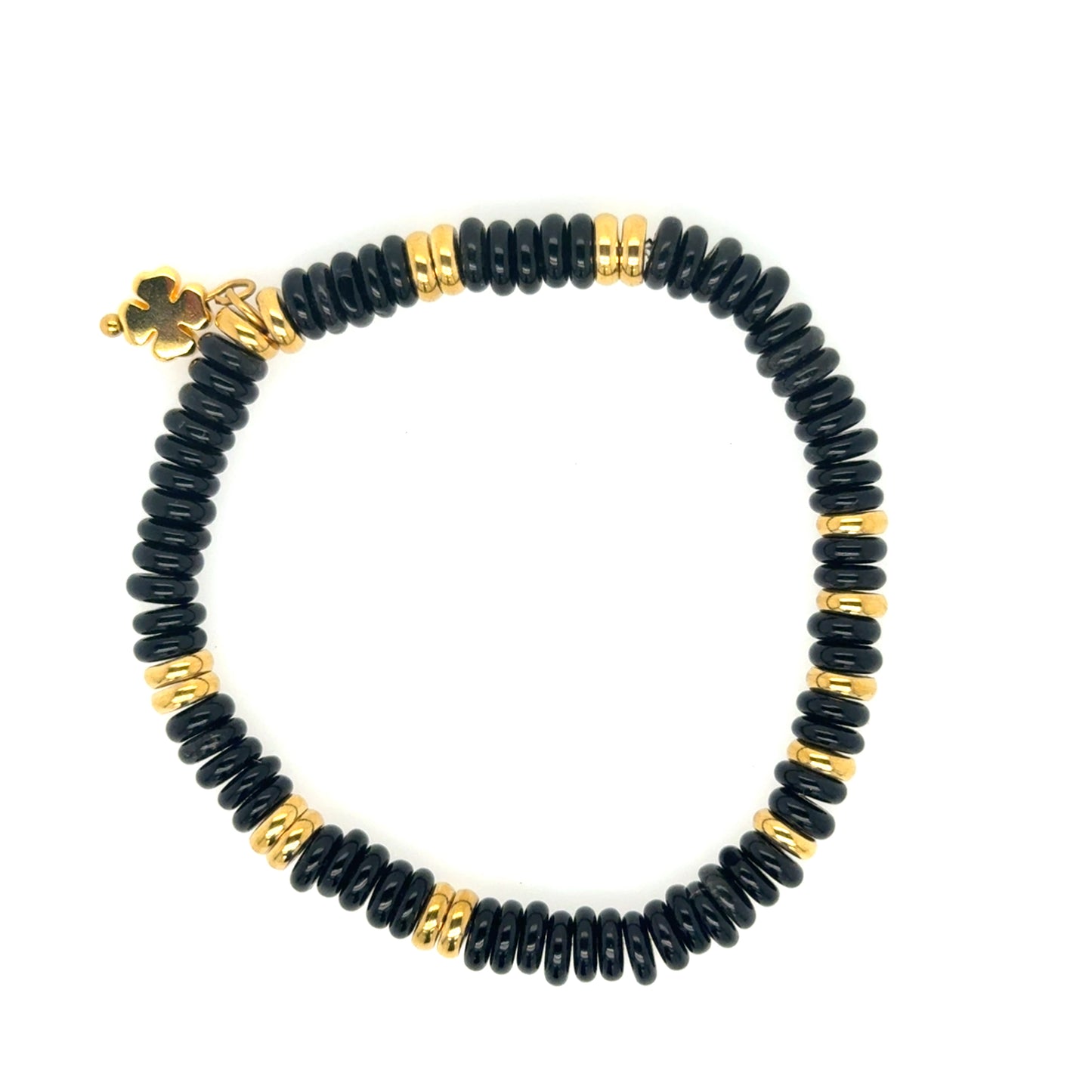 Lovely stretchy bracelet with Black Agate/gold rondelle flat/smooth beads and a small gold clover charm for good luck!