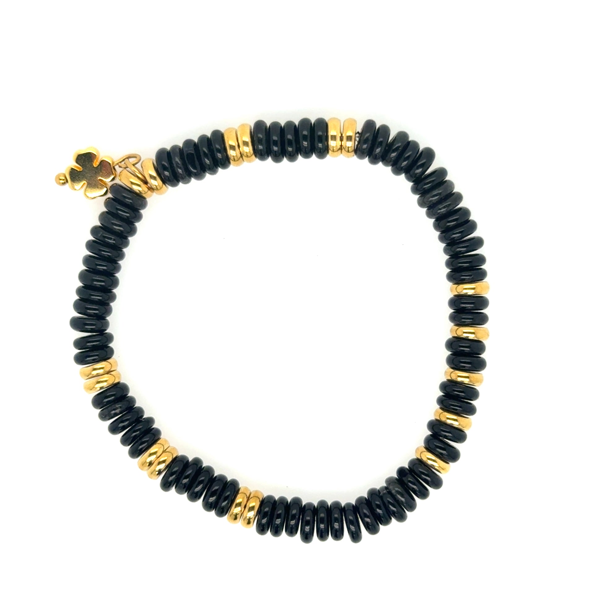 Lovely stretchy bracelet with Black Agate/gold rondelle flat/smooth beads and a small gold clover charm for good luck!