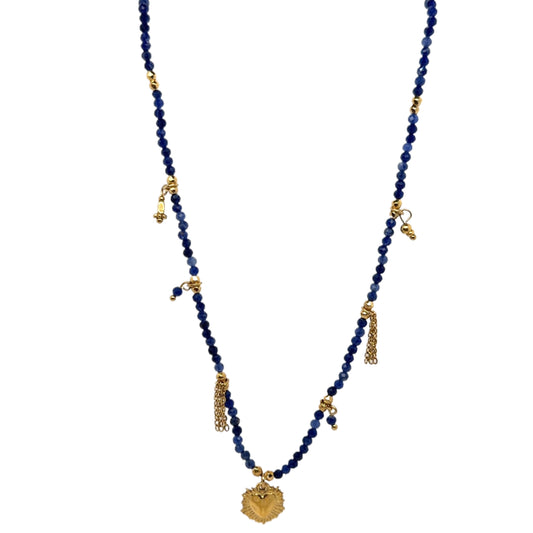 Necklace with tiny lapis lazuli dark blue beads and dangling small gold charms.