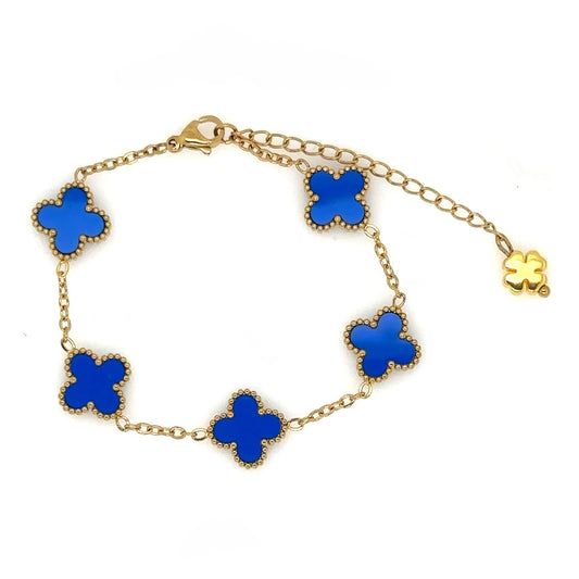 gold bracelet has five small clover charms in blue enamel