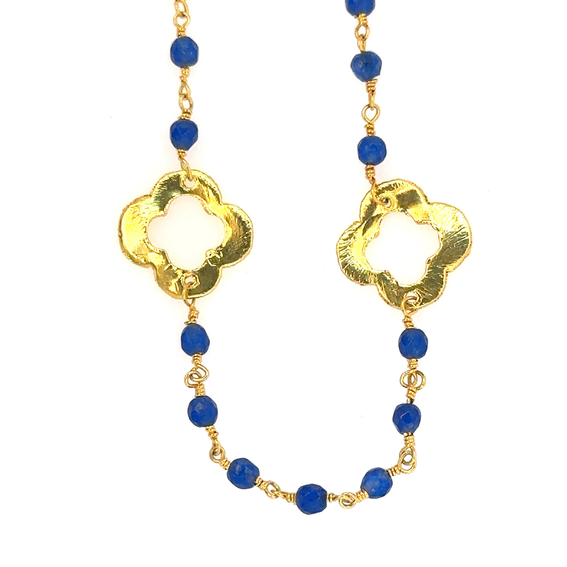 Pretty London Blue Topaz gemstone rosary chain with flat gold clover charms.