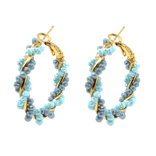 These lovely big beaded hoop earrings are twisted gold with light and grey blue beads.