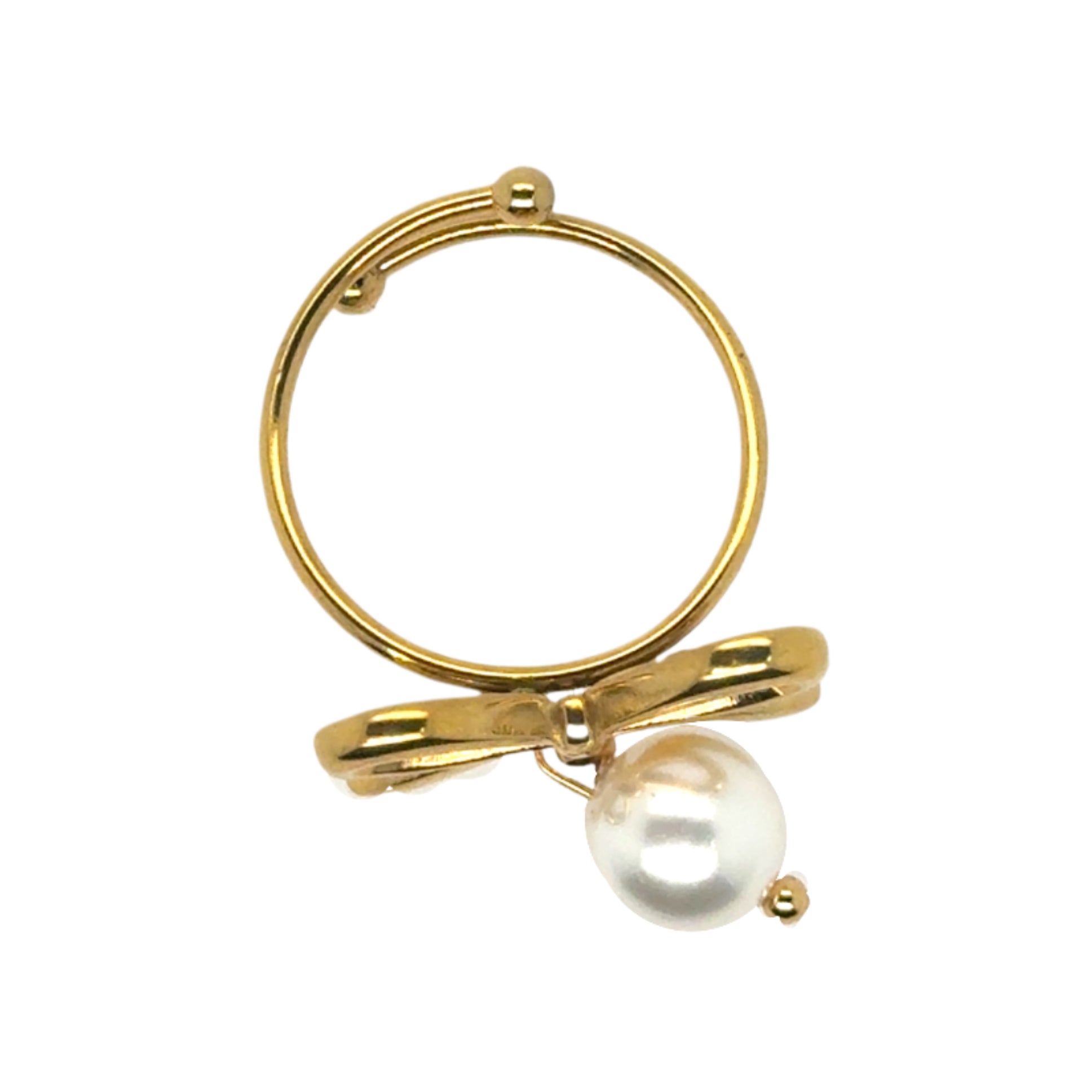 Gold adjustable ring with lovely bow and hanging pearl seen from above