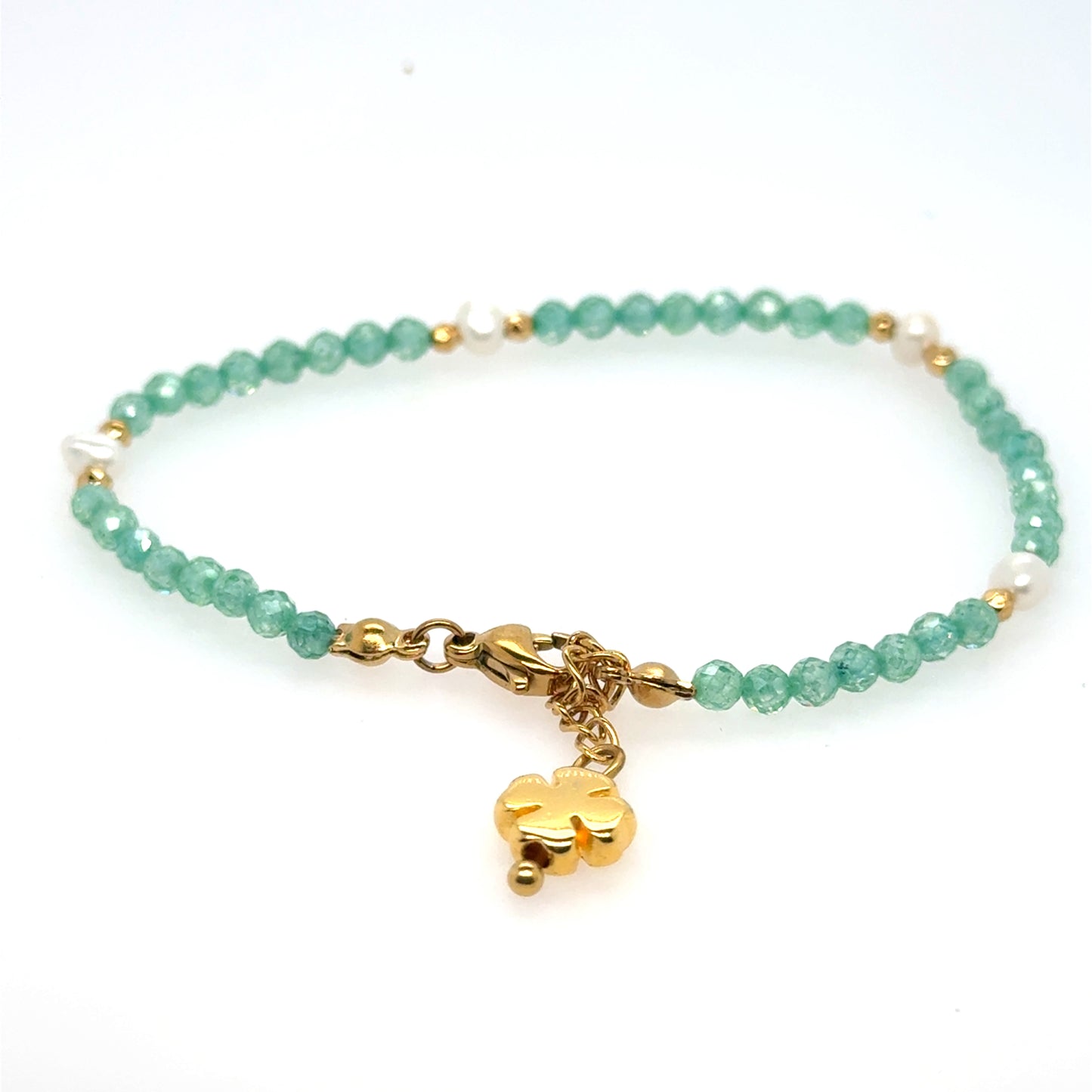 bracelet with tiny green beads and freshwater pearls with gold clover for luck!