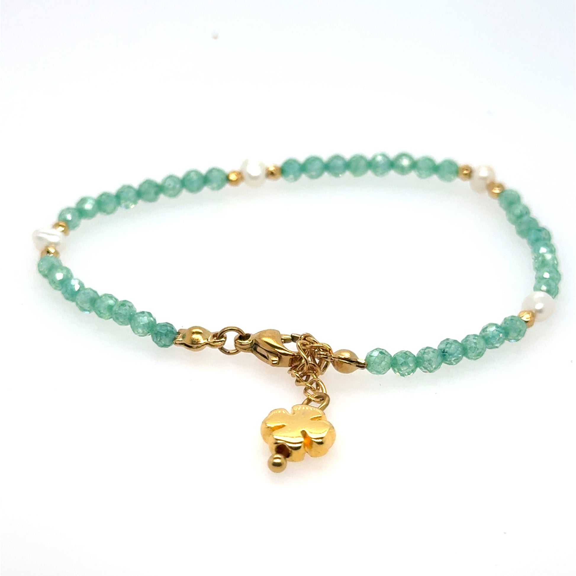 bracelet with tiny green beads and freshwater pearls with gold clover for luck!