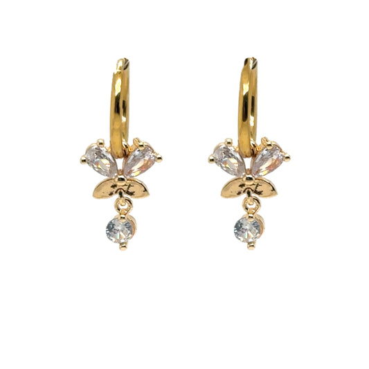 Delicate gold hoop earrings with sparkly butterfly and small dangling diamond charms