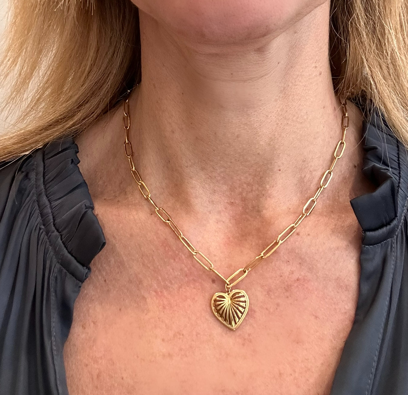 wearing Chain Link Necklace with Gold Heart Charm