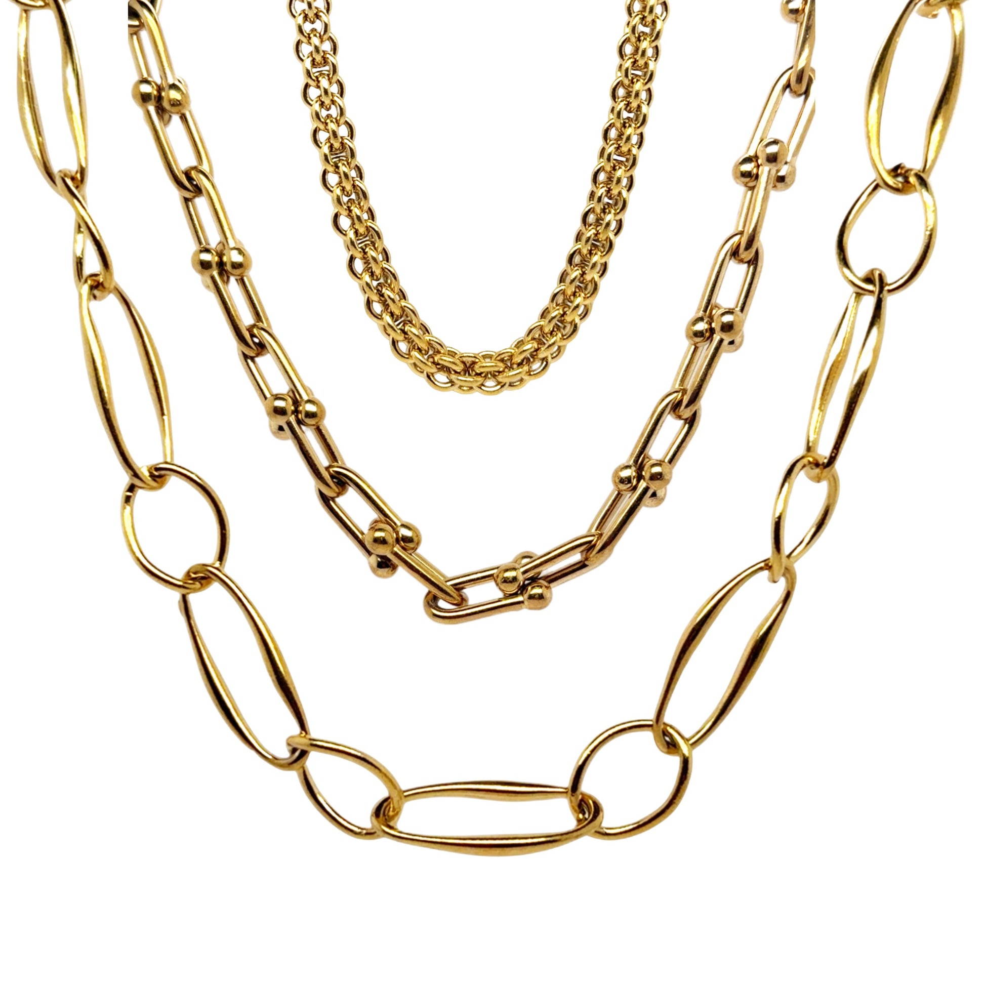 Three gold necklaces with different chain link styles
