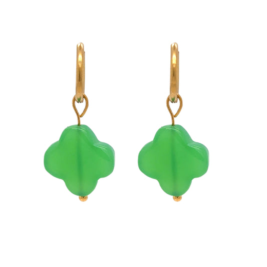 Delicate gold hoop earrings with clover shaped charms made of smooth semi-precious Chrysoprase apple green gemstones