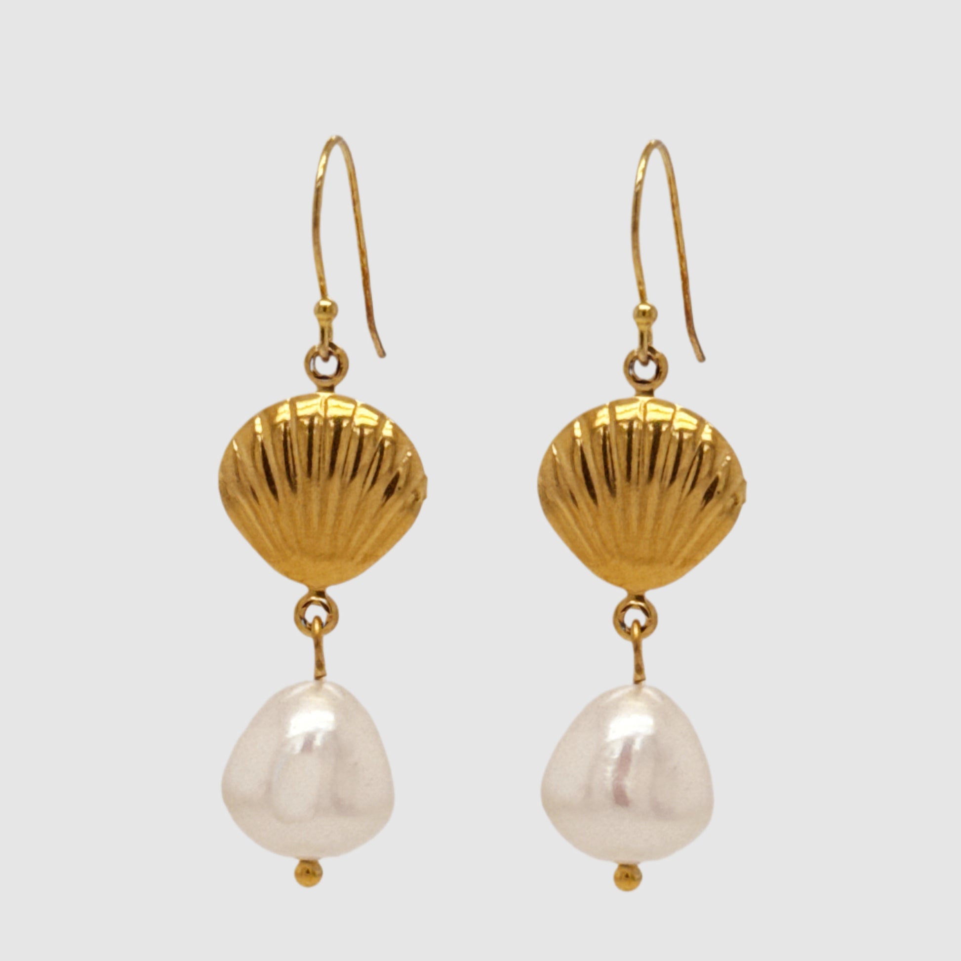Gold filled ear hooks with one gold shell charm and a dangling large Freshwater pearl