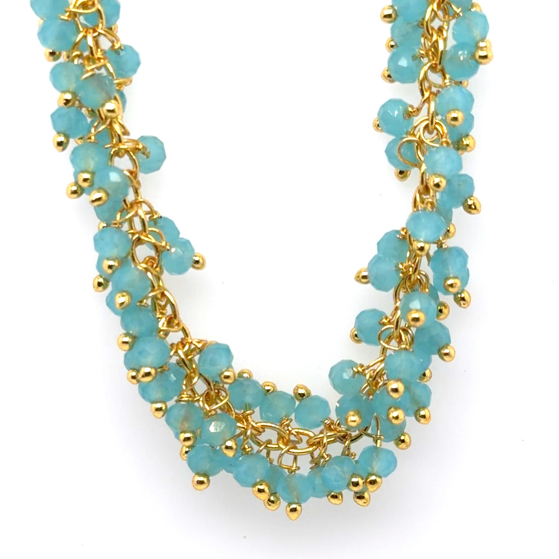 Necklace with turquoise beads and gold chain on a white background