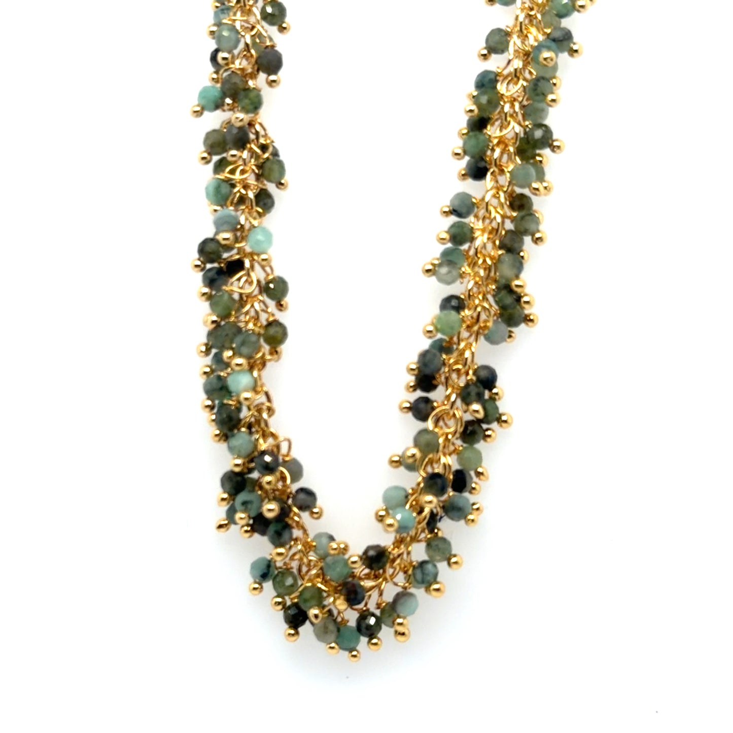 Necklace with green beads and gold chain on a white background