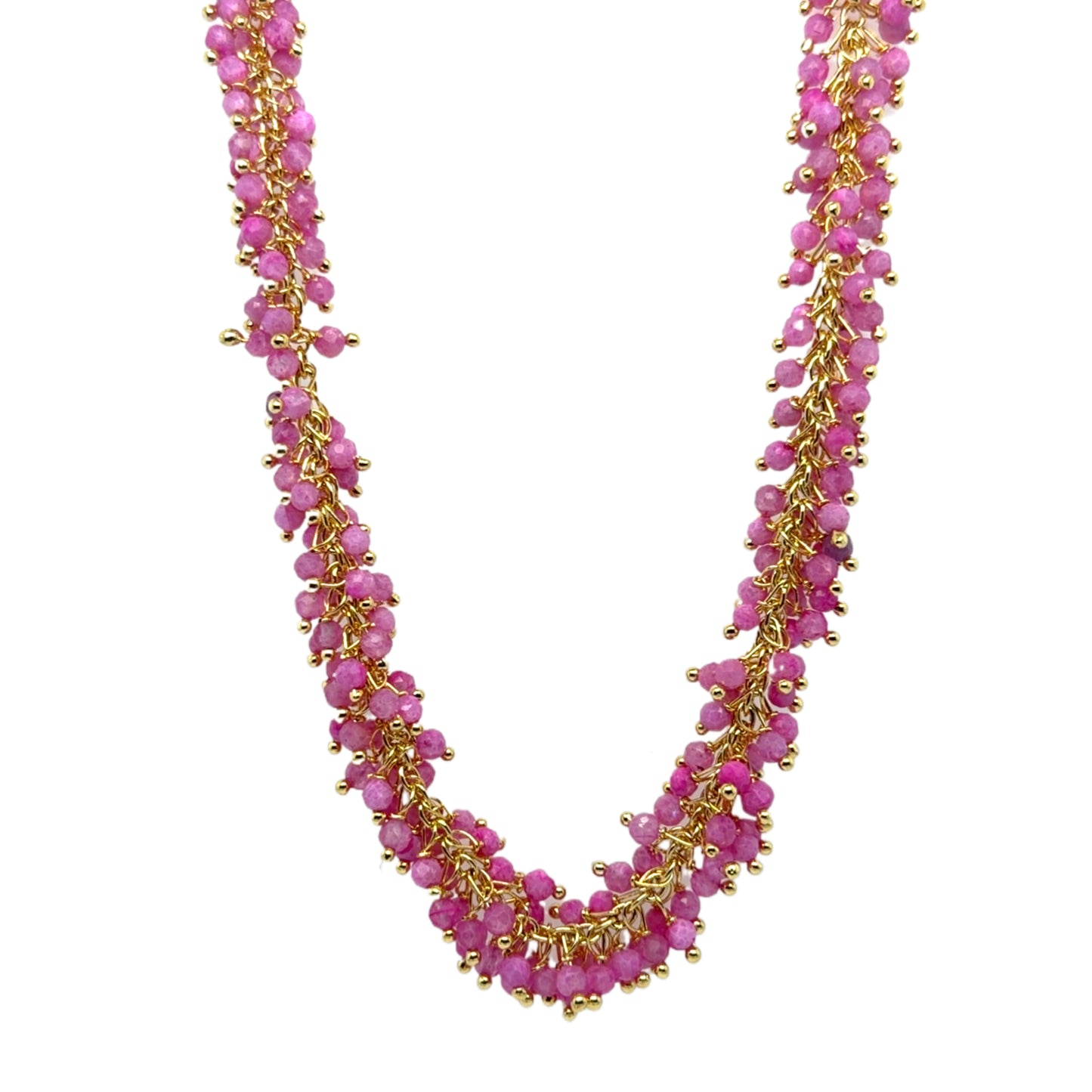 Necklace with pink beads and gold accents on a white background