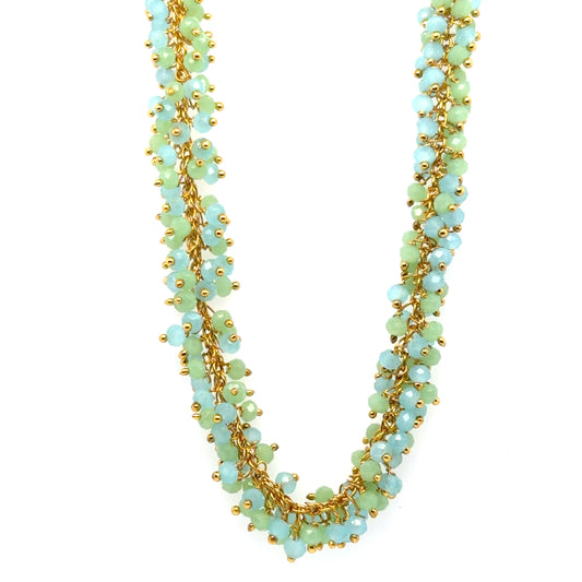 Gold necklace with cloudy blue Aqua Chalcedony and light green Prehnite gemstone beads arranged in dangling clusters