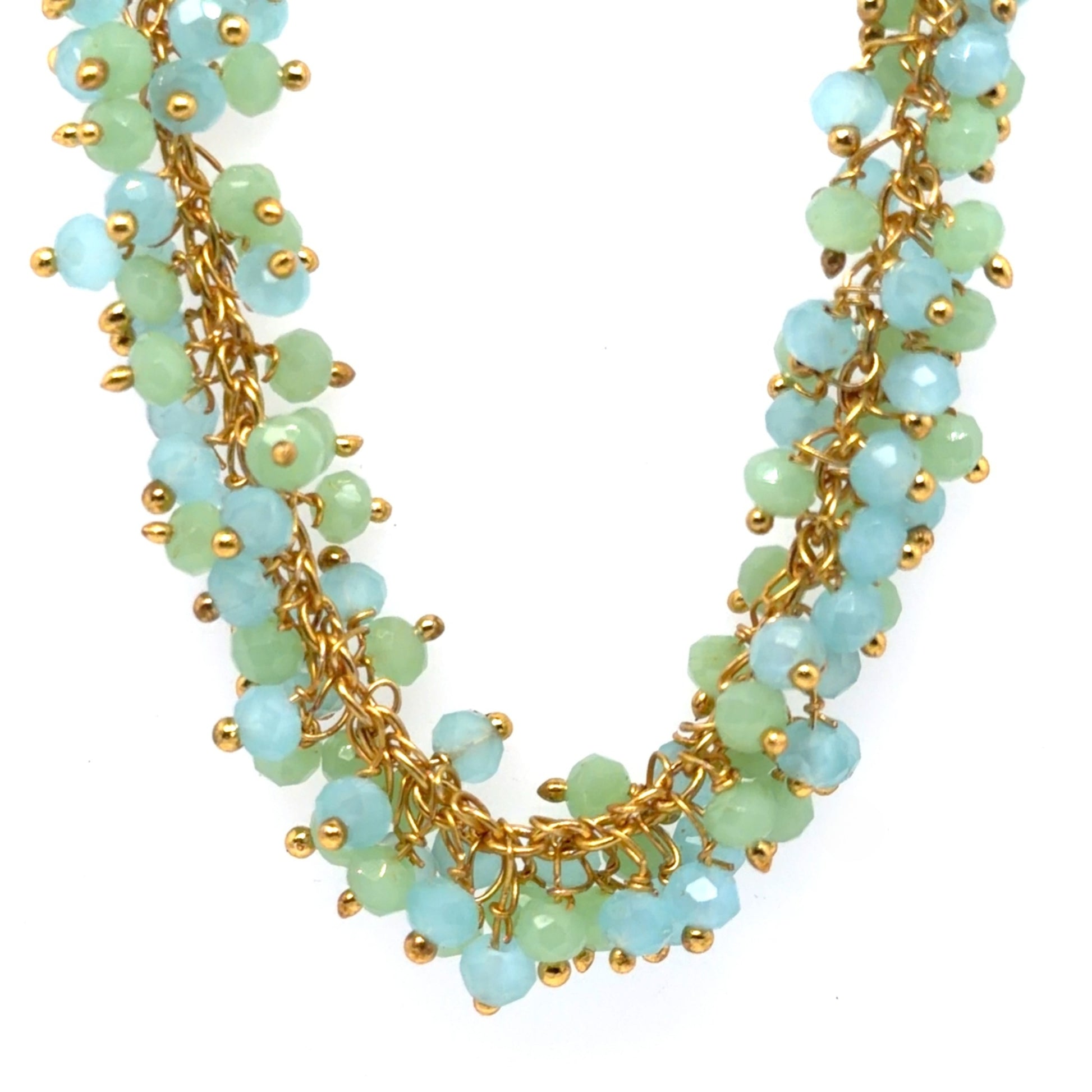 Necklace with gold chain and green beads on a white background