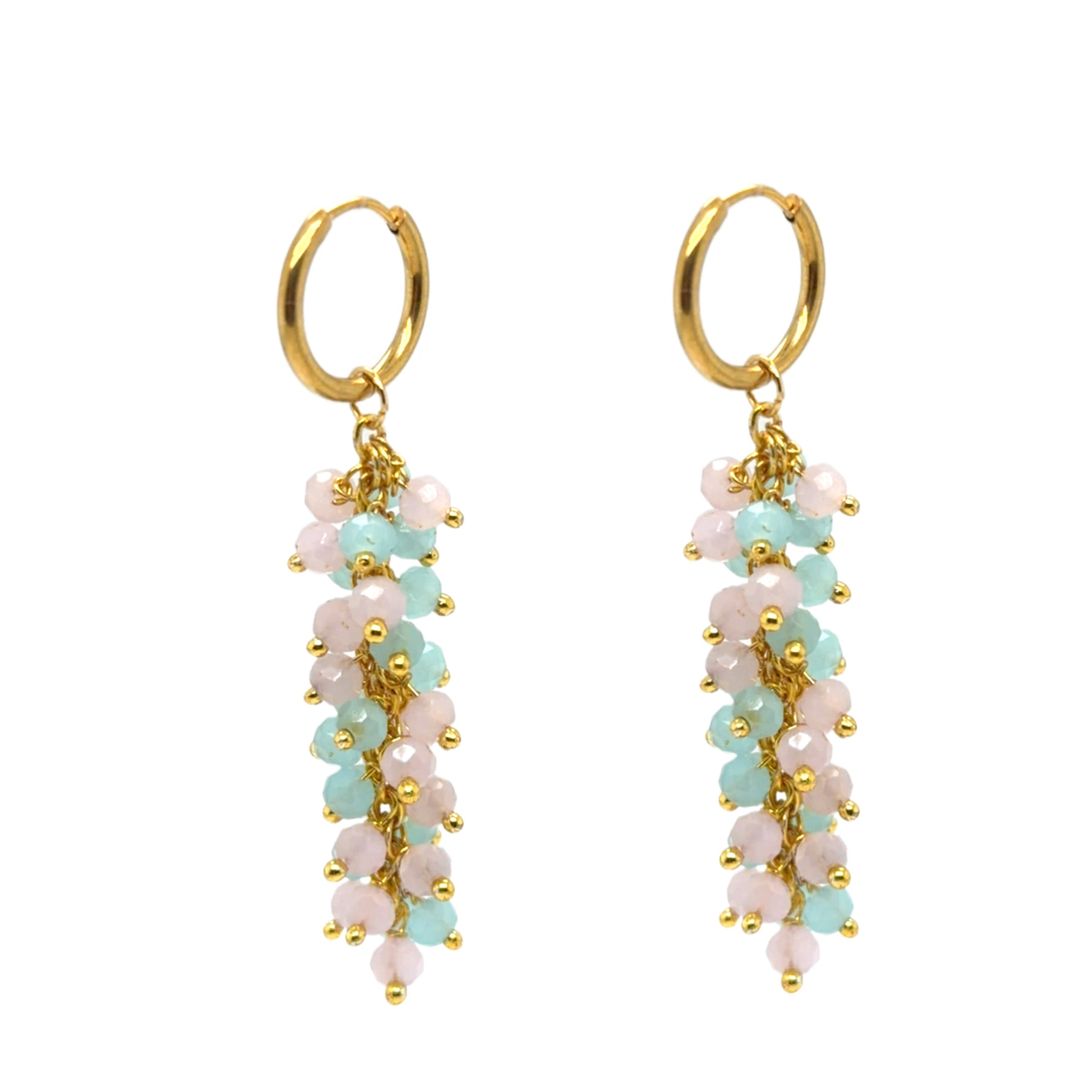 Gold hoop earrings with pink and blue beads on a white background
