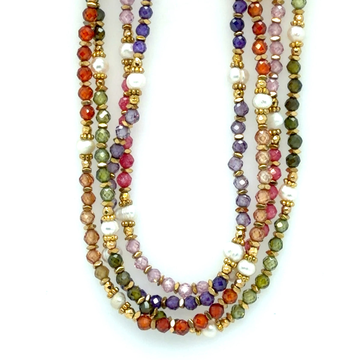 Four necklaces together with tiny coloruful and gold beads, and freshwater pearls