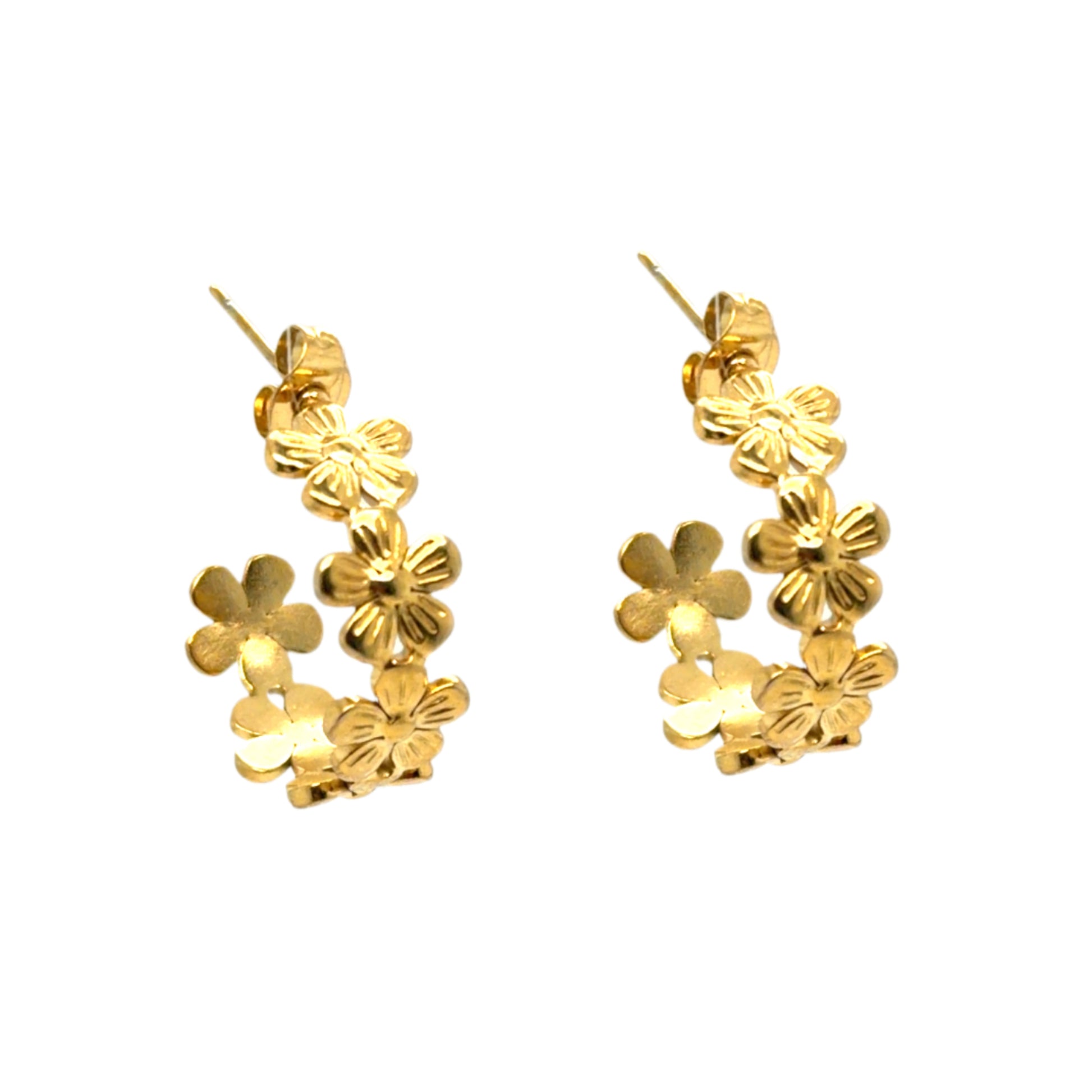Gold floral hoop earrings on a white background
