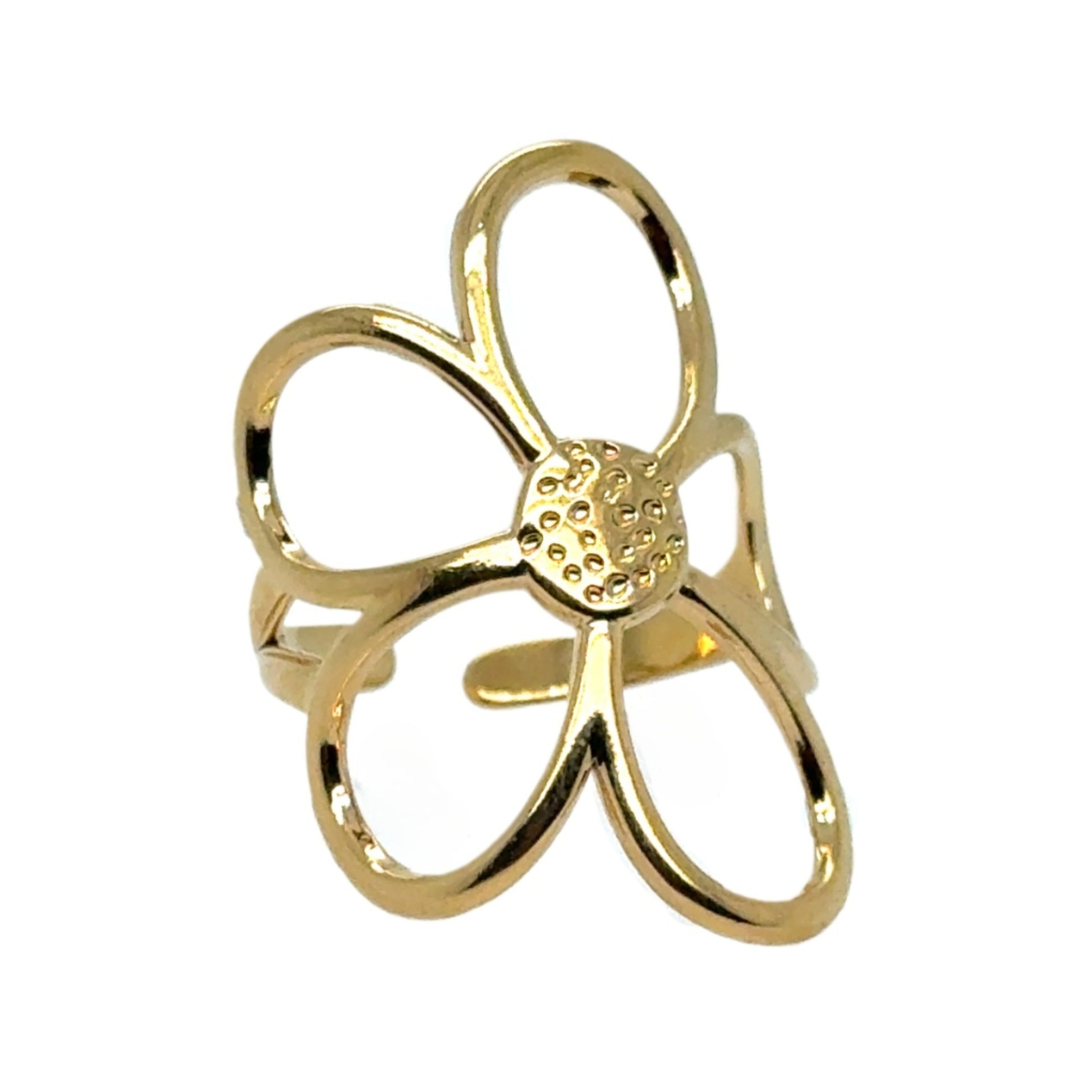 Gold flower-shaped ring on a white background