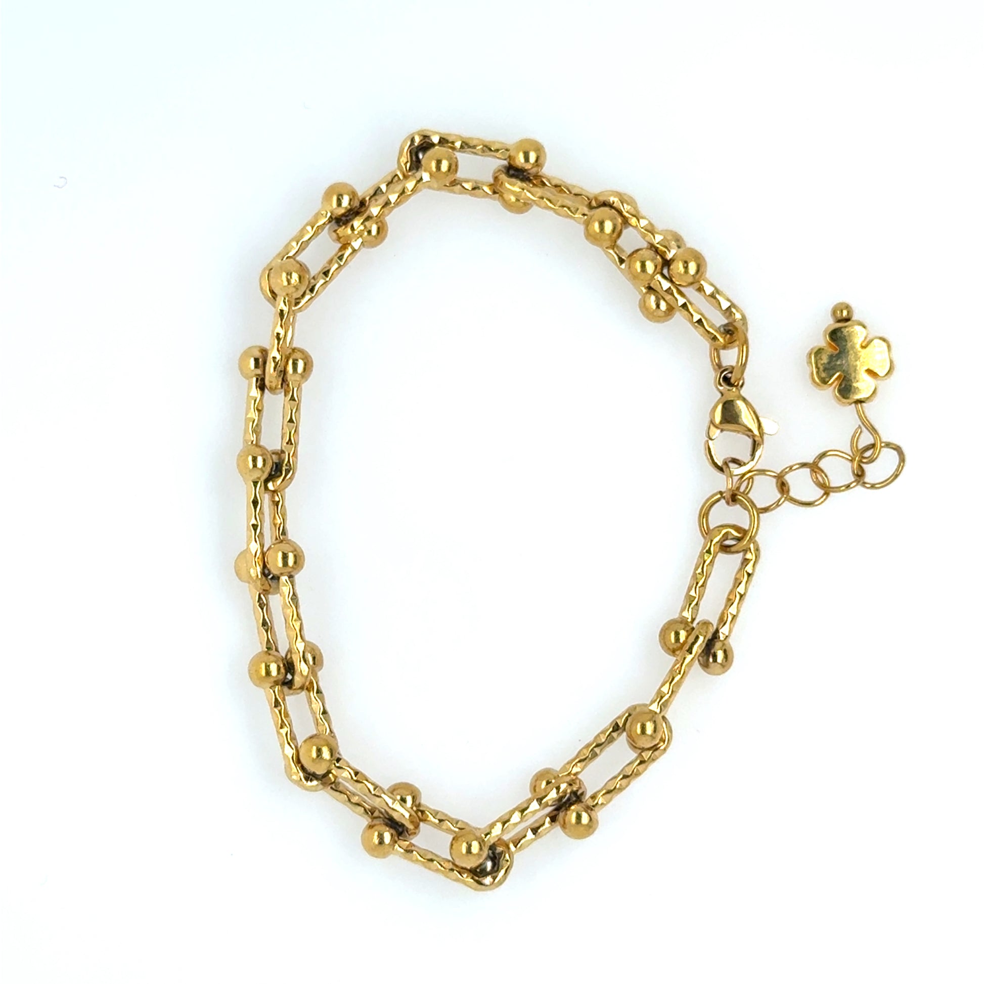 This gold bracelet has a U shaped links and hammered design