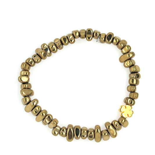 Lovely stretchy bracelet with gold Hematite semi-precious gemstone beads shaped like pebbles and a small gold clover charm for good luck