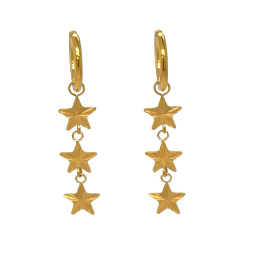 Delicate gold hoop earrings with three small dangling star charms