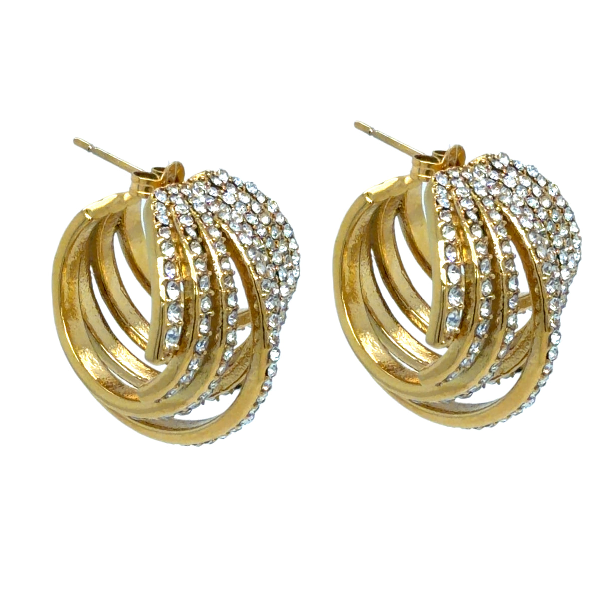 Gorgeous curved gold earrings with cubic zirconia sparkles seen from the side