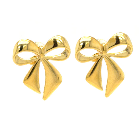 Gold bow-shaped earrings on a white background