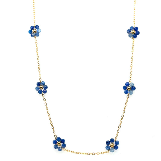 Necklace with five small dark blue and gold flowers on a delicate chain